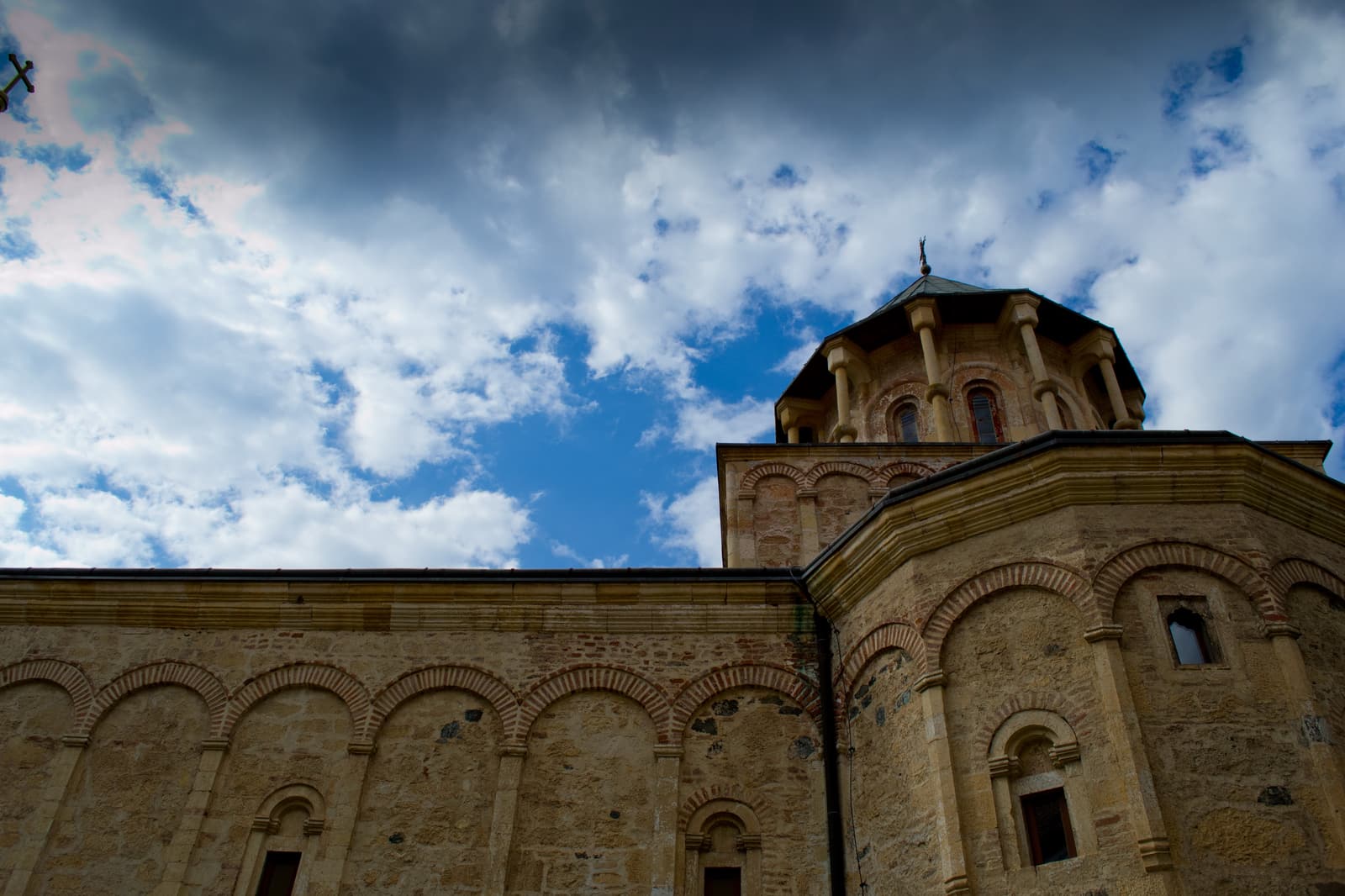 The church of Novo Hopovo Monastery with its colonnaded dome among trees