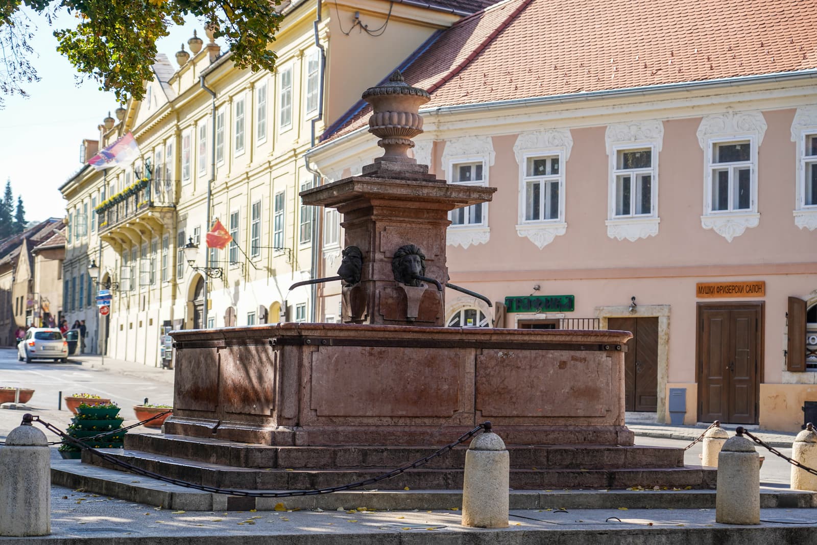 The main square of Sremski Karlovci with the Orthodox cathedral and the Four Lions fountain