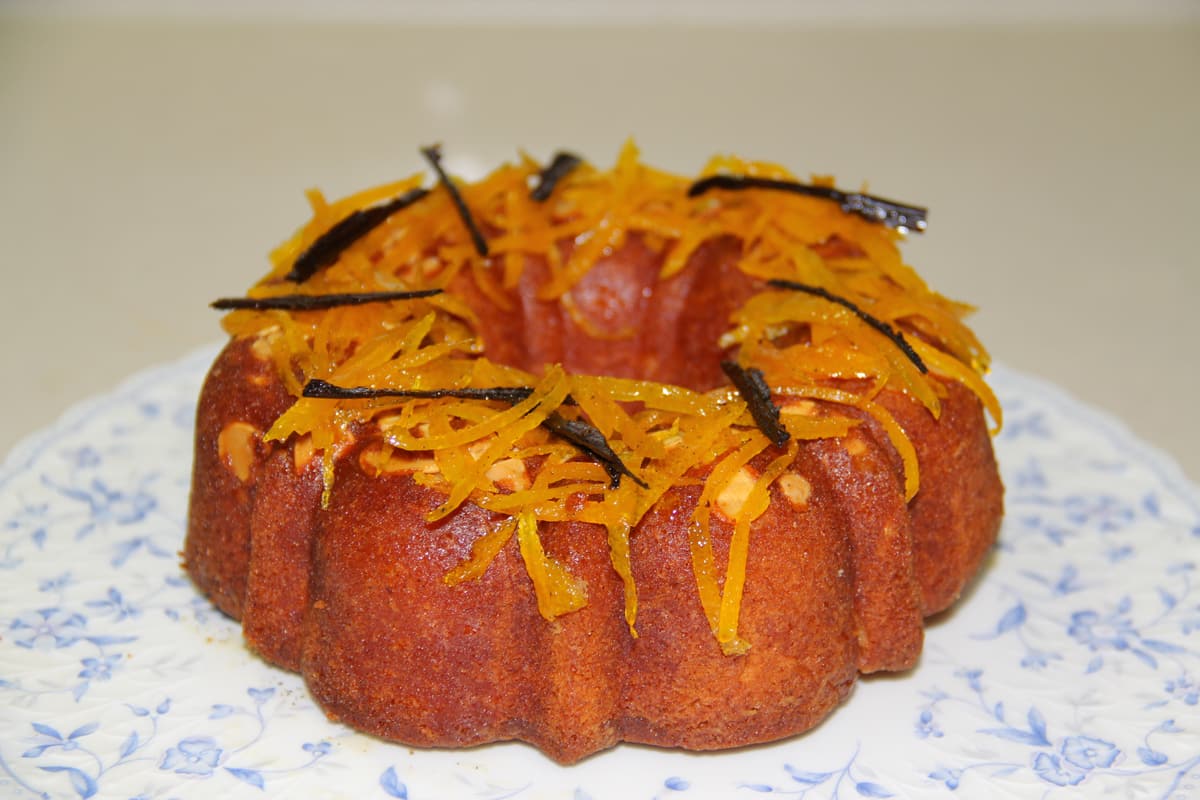 A glazed kuglof ring cake on a plate