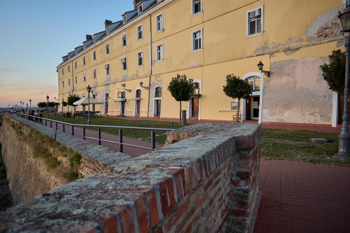 The long baroque barracks along the brick ramparts of Petrovaradin Fortress
