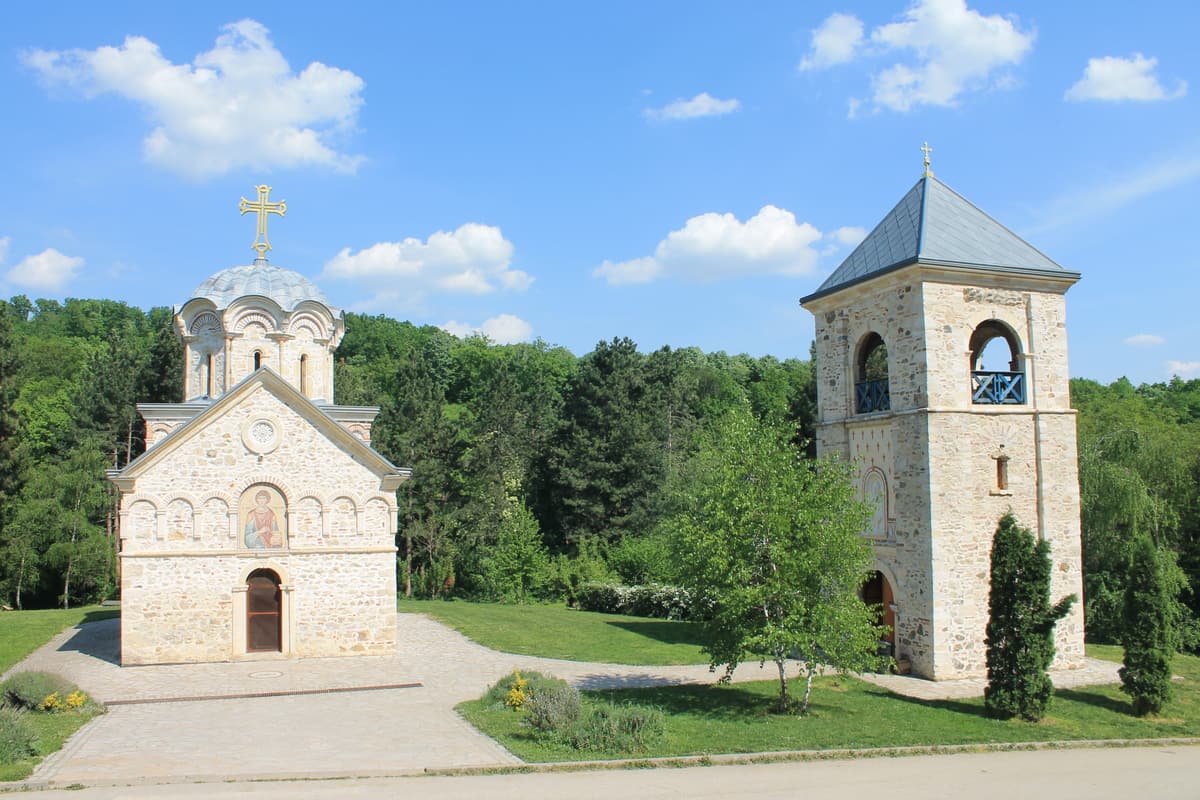 The small domed church and stone belfry of Staro Hopovo Monastery