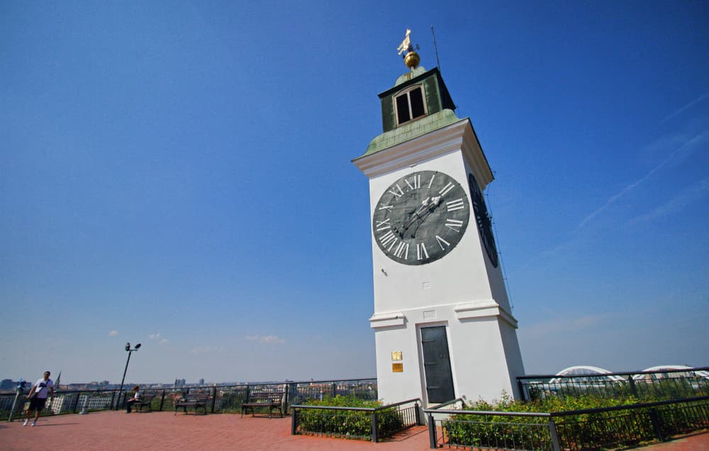 The clock tower of Petrovaradin Fortress above the Danube