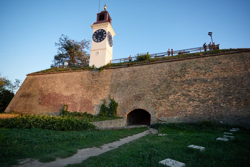 Brick ramparts and the clock tower of Petrovaradin Fortress